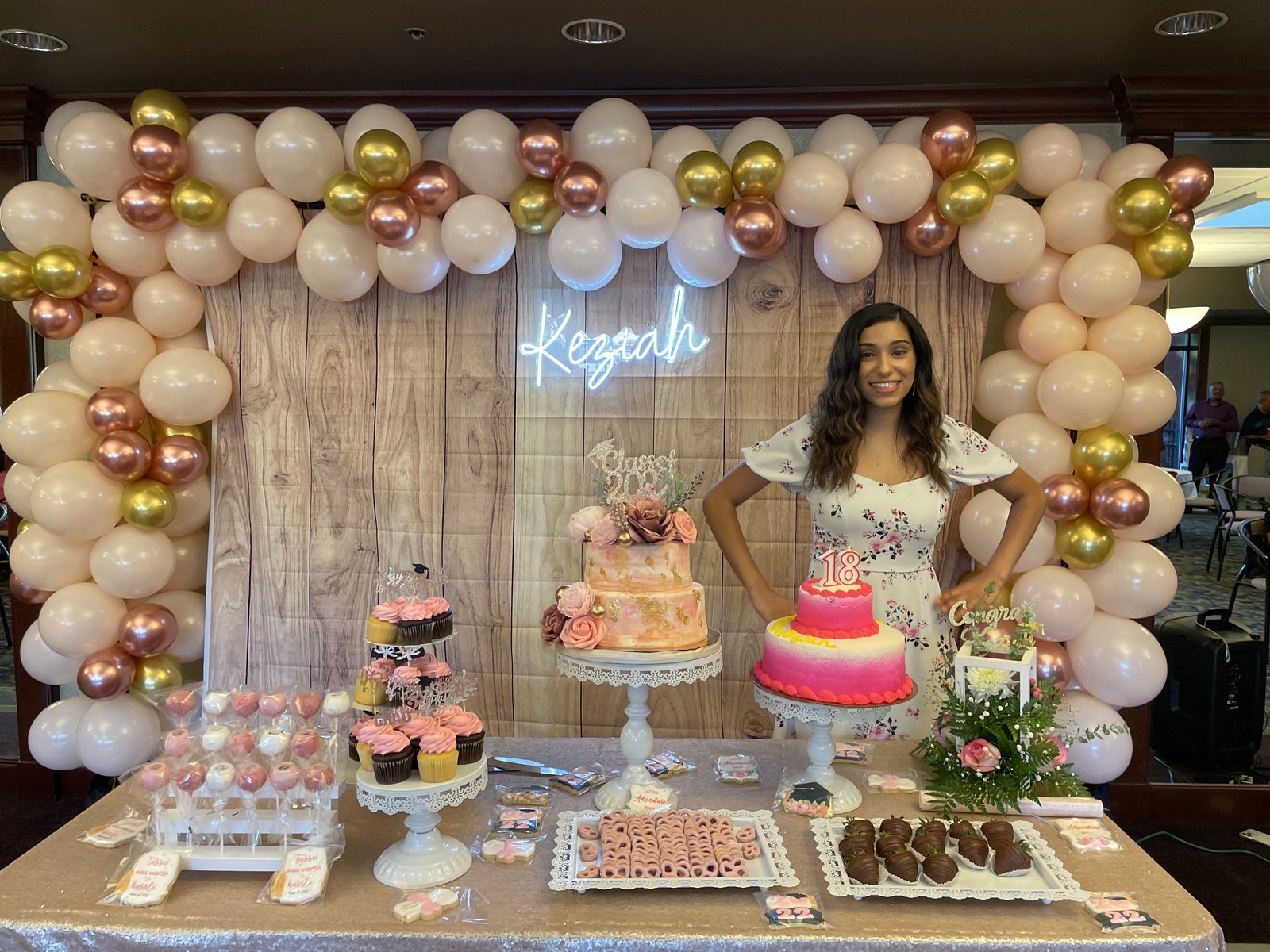 Graduation dessert table with custom cakes